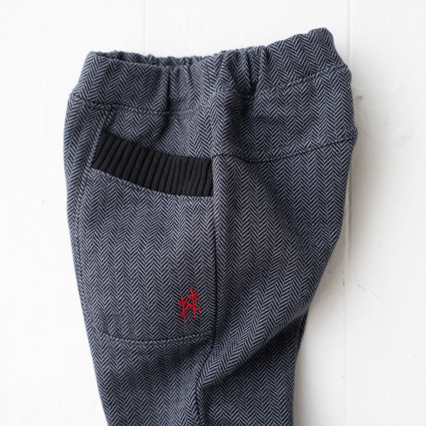 ニットへリンボーンパンツ GRAY