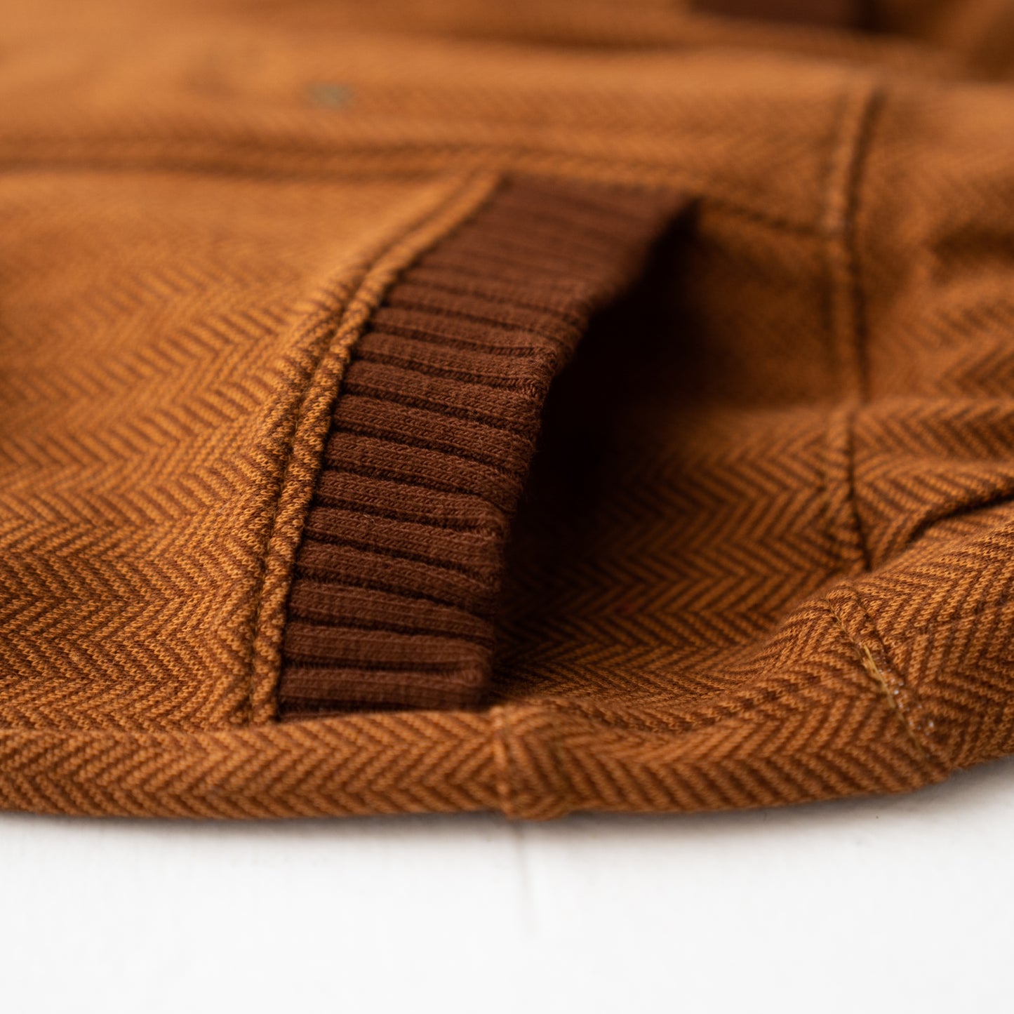 ニットへリンボーンパンツ BROWN