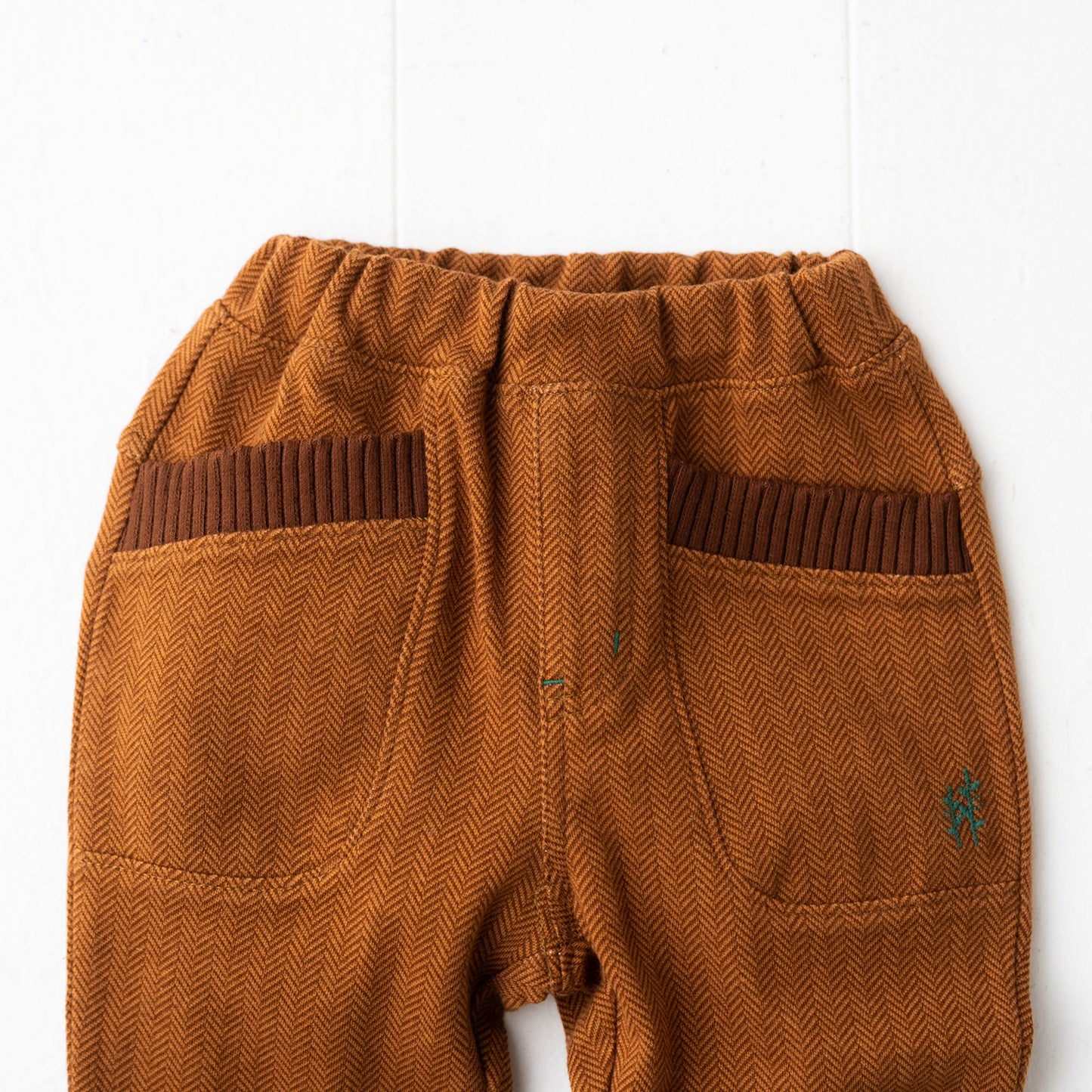 ニットへリンボーンパンツ BROWN