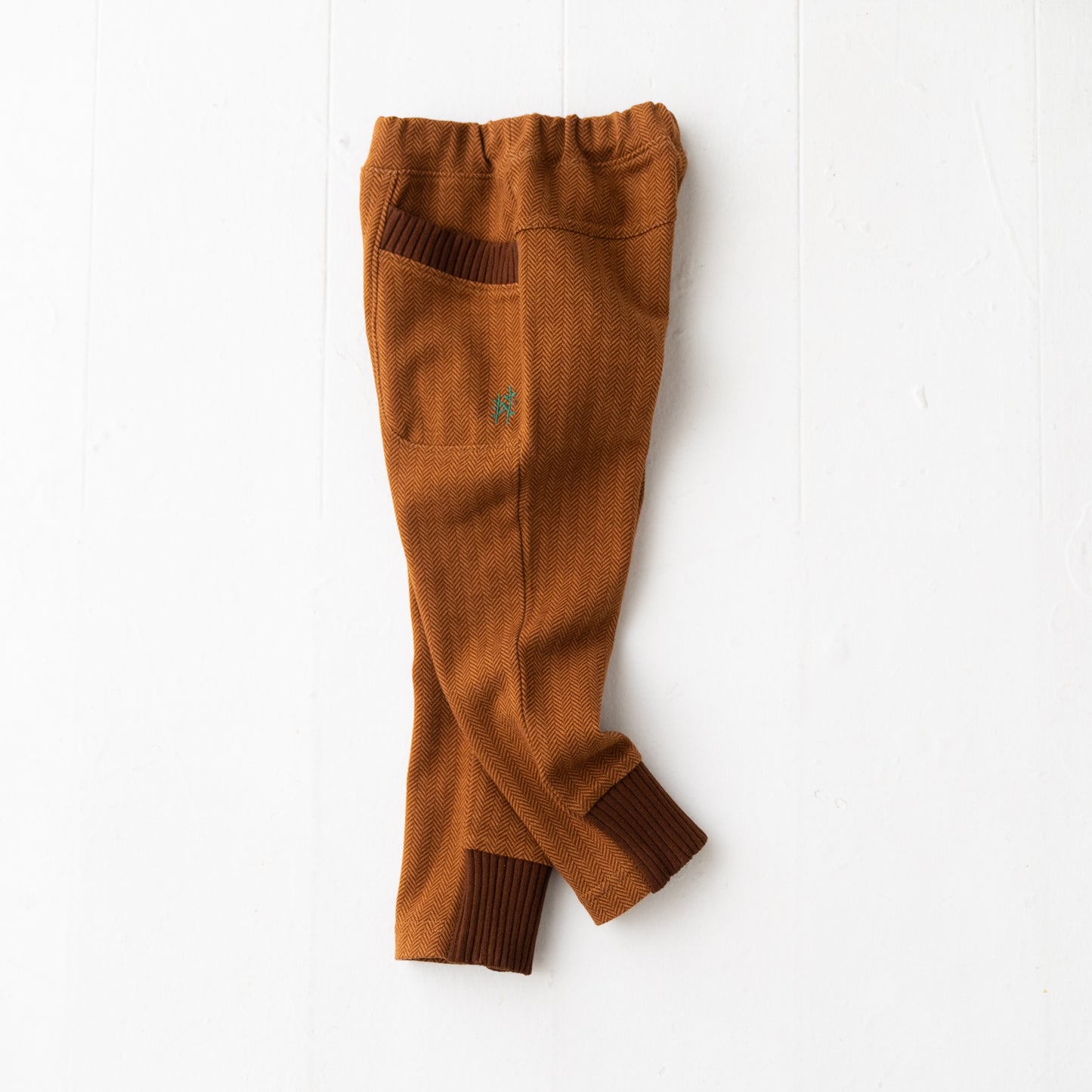 ニットへリンボーンパンツ BROWN