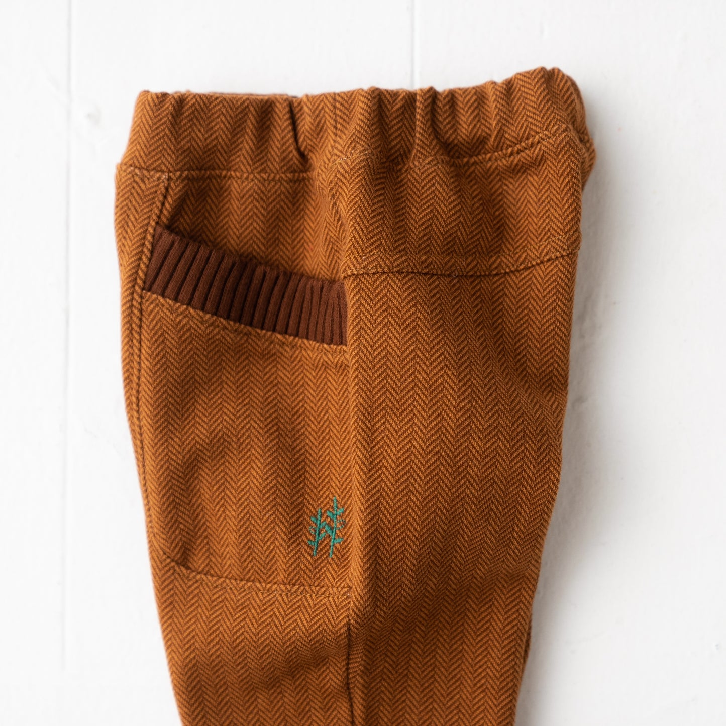 ニットへリンボーンパンツ BROWN